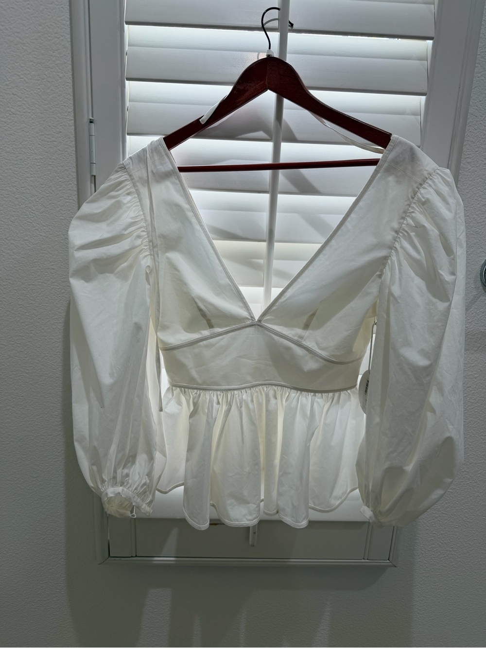 STAUD White Cream Deep V Peplum Blouse with Puff Sleeves